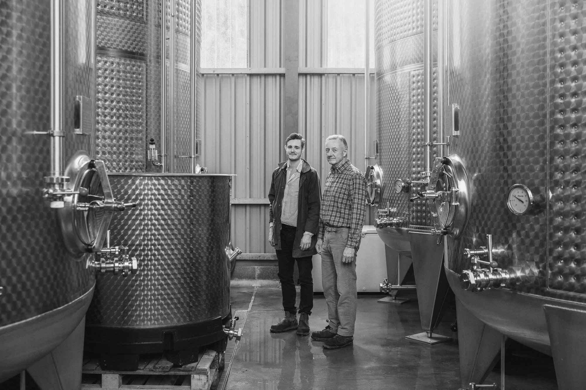 Robert and Angus Robinson in the tank room at their craft cider works in Little Hereford. We ferment in high grade stainless steel to produce clean fermentations that champion the character of our local apples.